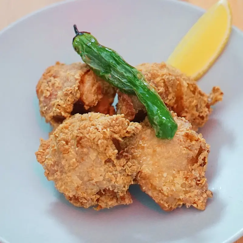 Chicken Kara-Age - Crispy boneless Japanese fried chicken, golden-brown exterior with tender and juicy interior, served in 4 pieces