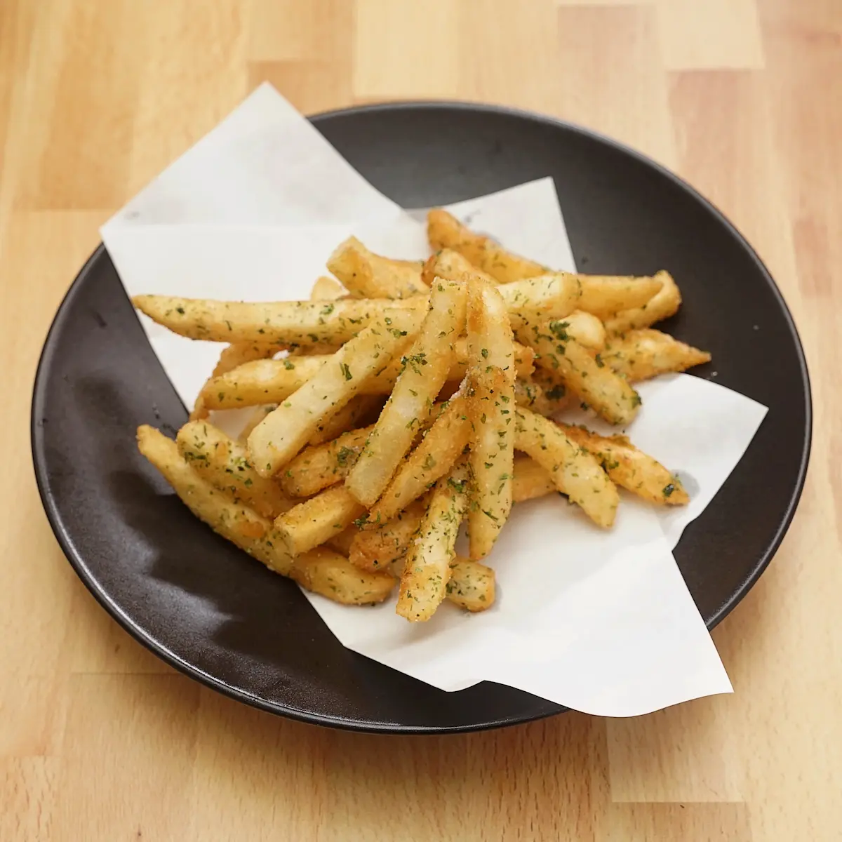 Gachi Fries - French fries tossed in signature burnt garlic oil, vegan