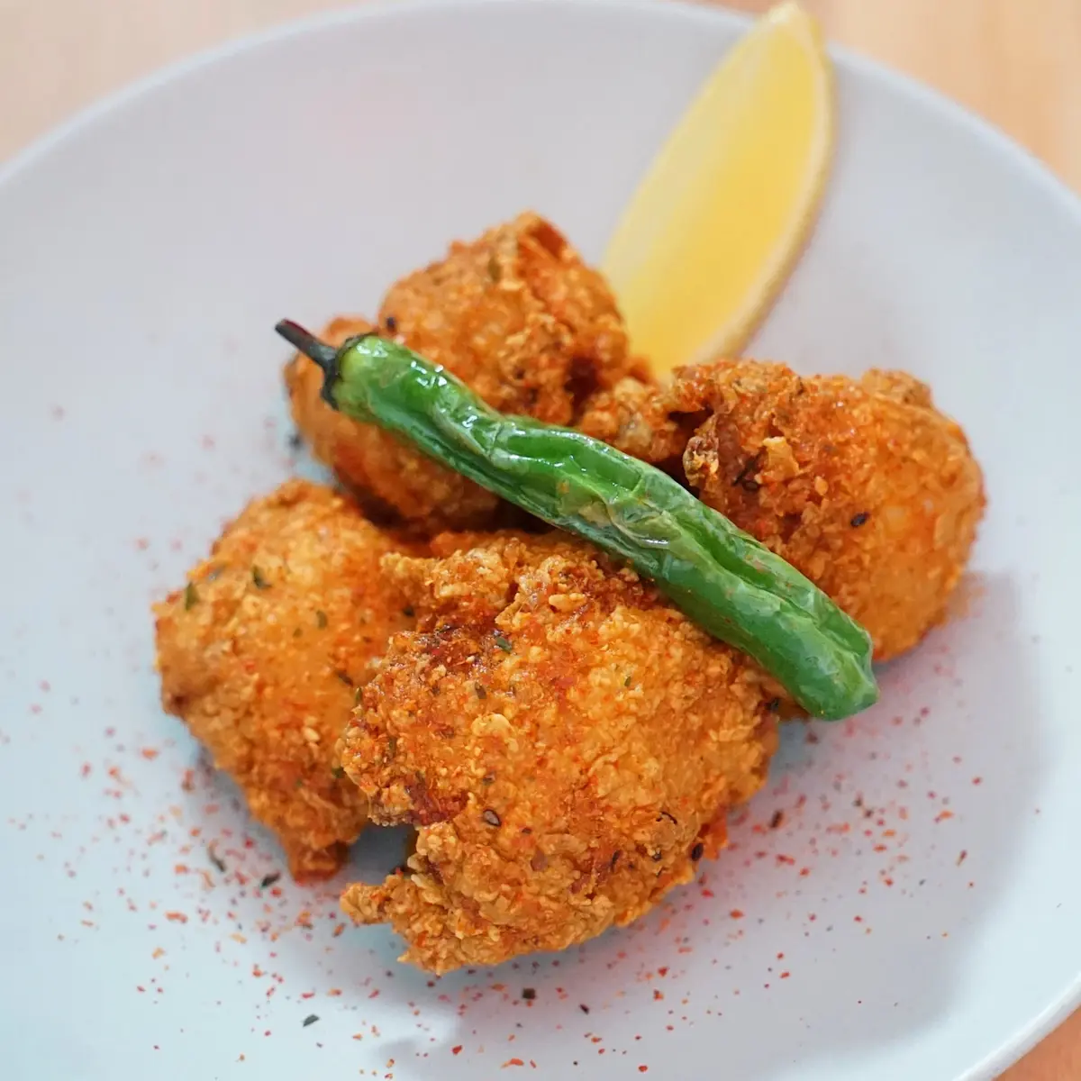 Spicy Chicken Kara-Age - Crispy boneless fried chicken with bold spice, golden-brown exterior, served in 4 pieces