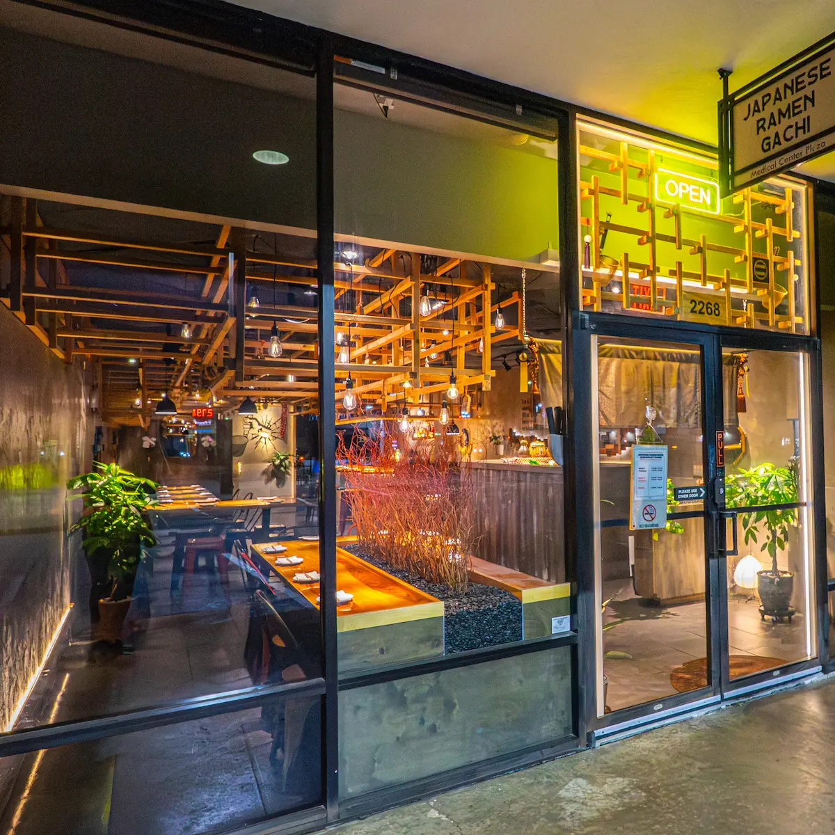 The understated exterior of Japanese Ramen Gachi at night, a hidden sanctuary in Houston for true ramen purists.